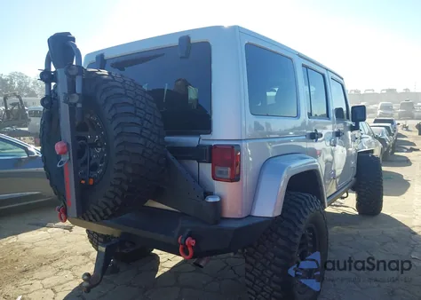 2012 Jeep Wrangler Unlimited Rubicon из США, поврежденный, VIN 1C4HJWFG7CL259255